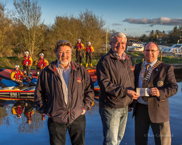 President Roy Crawford presenting a cheque for £4,500 to David Robinson R.N.L.I