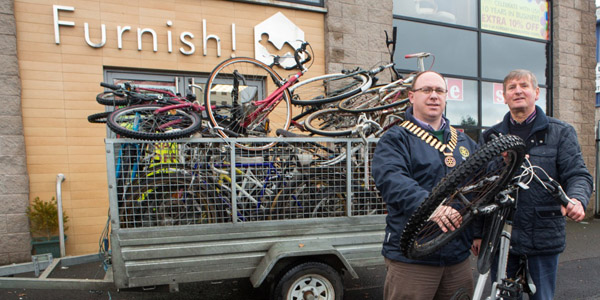 President Roy with Ivan Kee and bikes