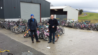 President Roy with Ivan Kee and bikes