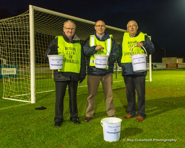 President Roy Crawford presenting a cheque for £1,000 to Mr Willie Prescott