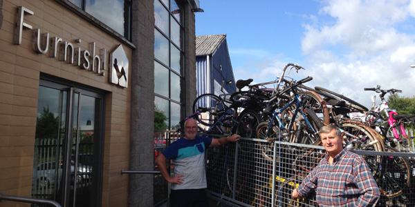 President Roy with Ivan Kee and bikes
