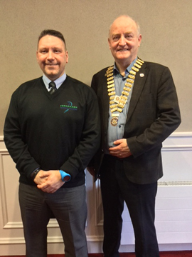 Ian Archer (Fermanagh Rural Community Transport) with President Henry